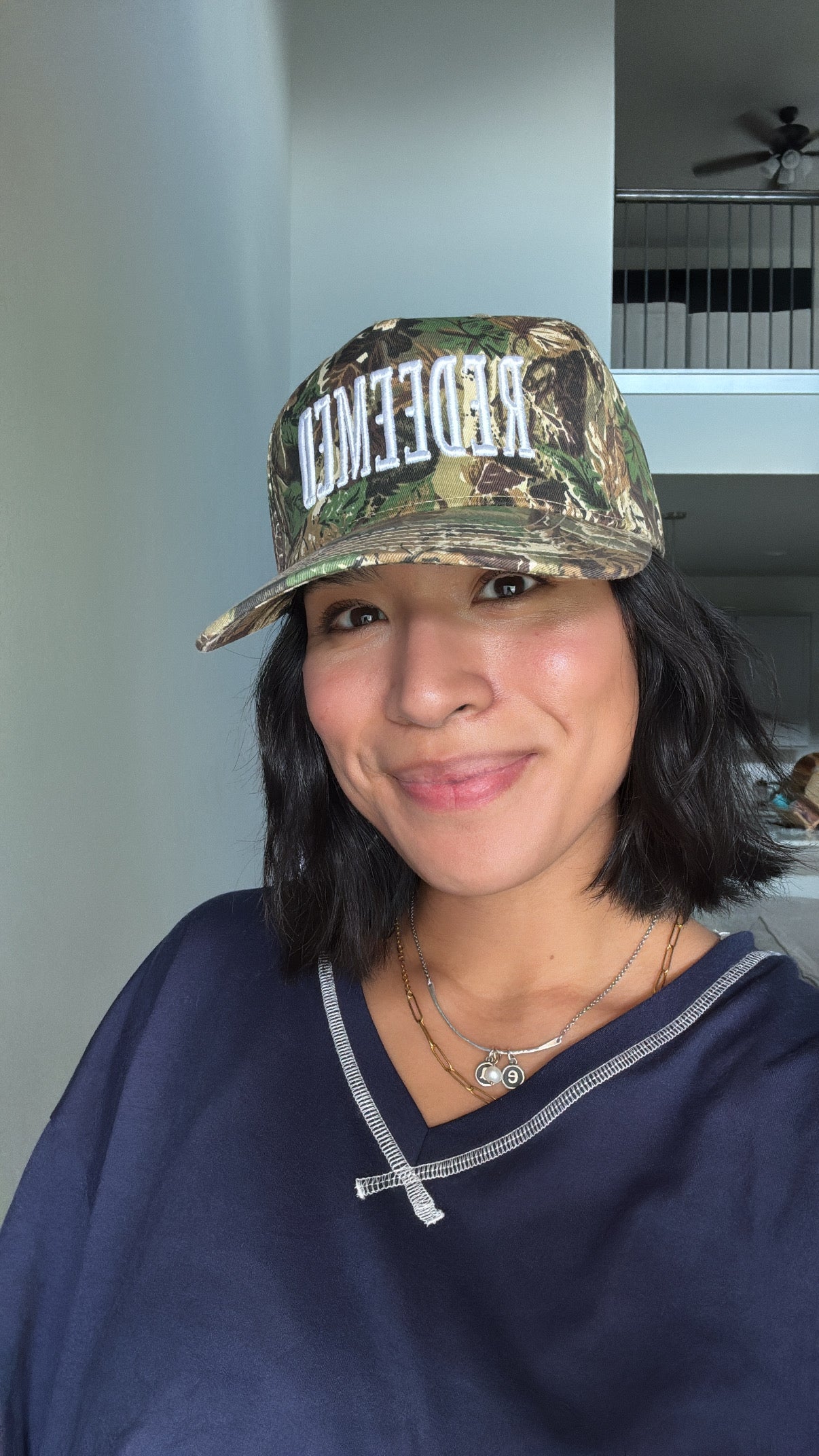 Camo REDEEMED Trucker Hat